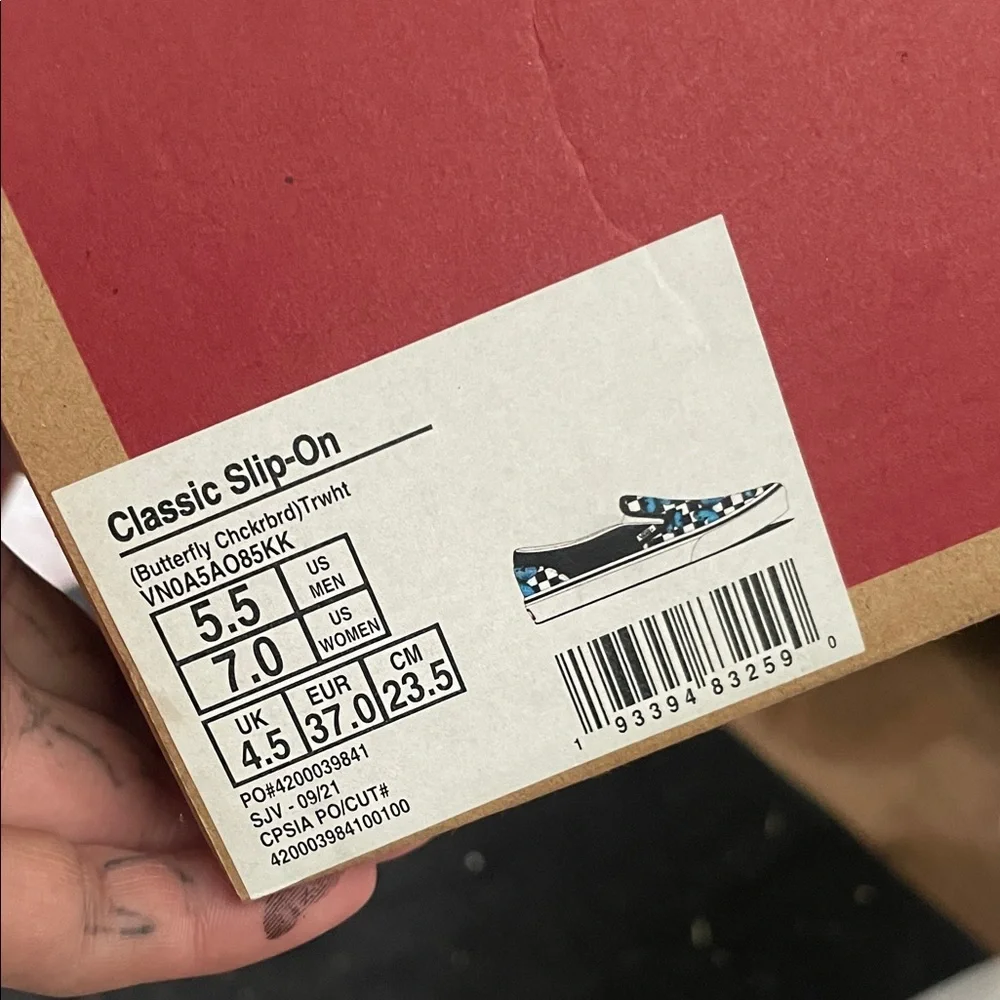 Vans Black and White Checkered Slip-Ons with Blue Butterflies - Picture 5 of 5